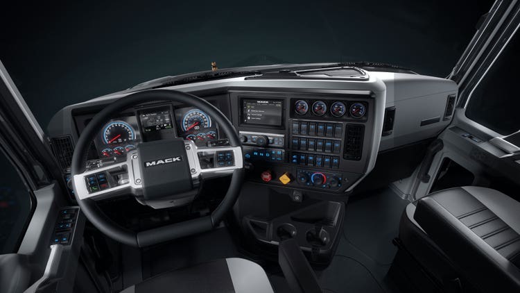 Ergonomic dash wraps around drivers to put everything in reach.